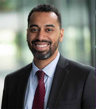 Headshot of Board of Education Zone 1 Member Iton Udosenata